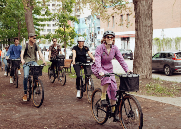people on a bicycle on a bike tour